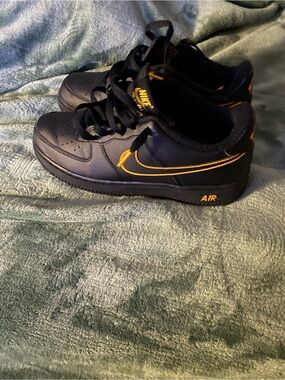 Nike Kids Black Sneakers with Orange Swoosh